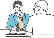 葬祭ディレクターと対面相談しているイメージ